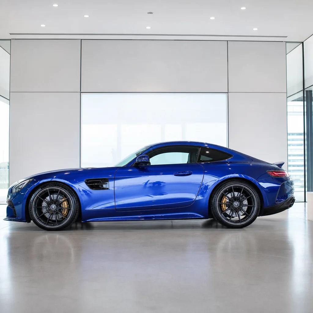 Metallic Sepang Blue gloss colored PPF wrapped on a Mercedes-AMG GT side profile | Veloro