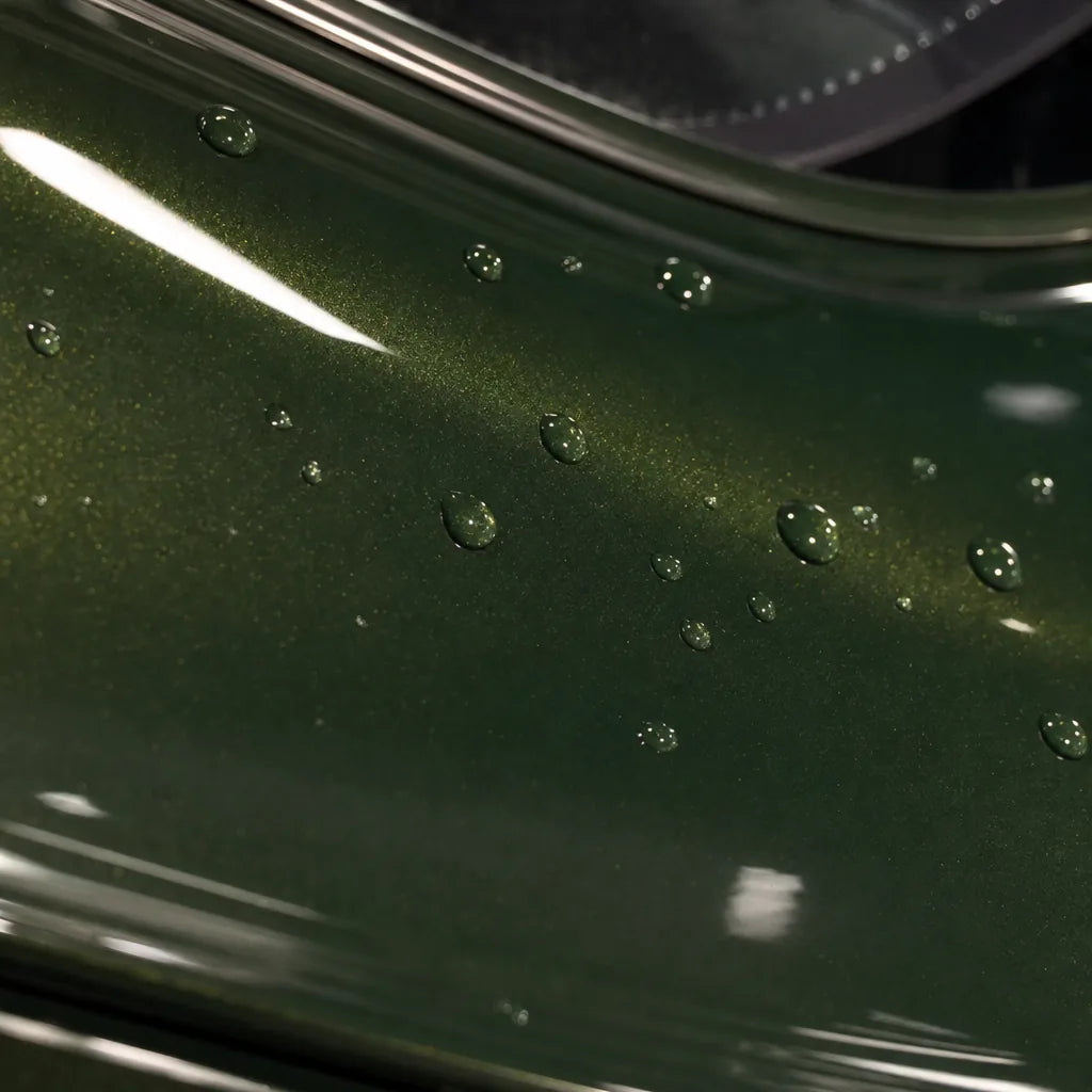 Close-up of Metallic Sonoma Green gloss colored PPF surface texture | Veloro