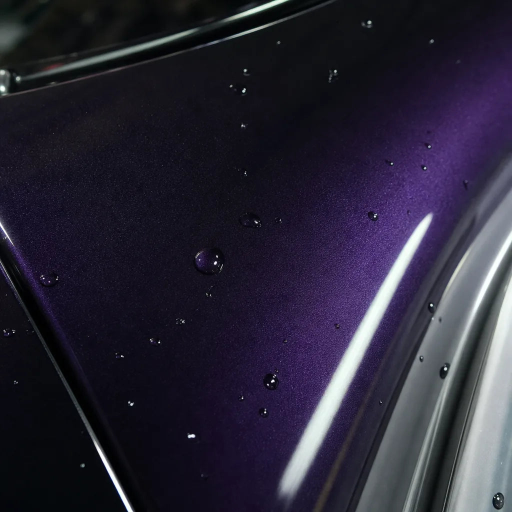 Close-up of Metallic Super Purple gloss colored PPF surface texture | Veloro