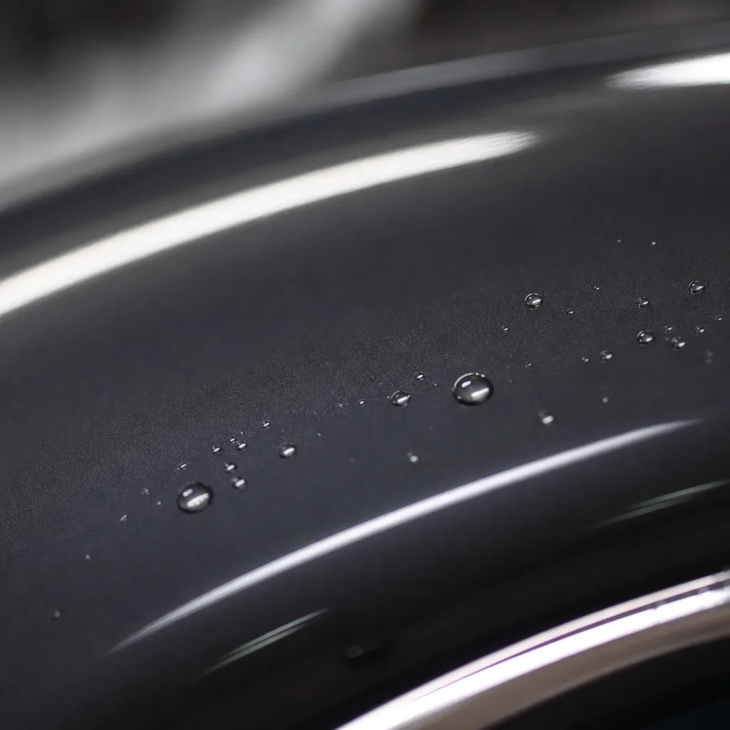 Close-up of Metallic Tungsten Black gloss colored PPF surface texture | Veloro
