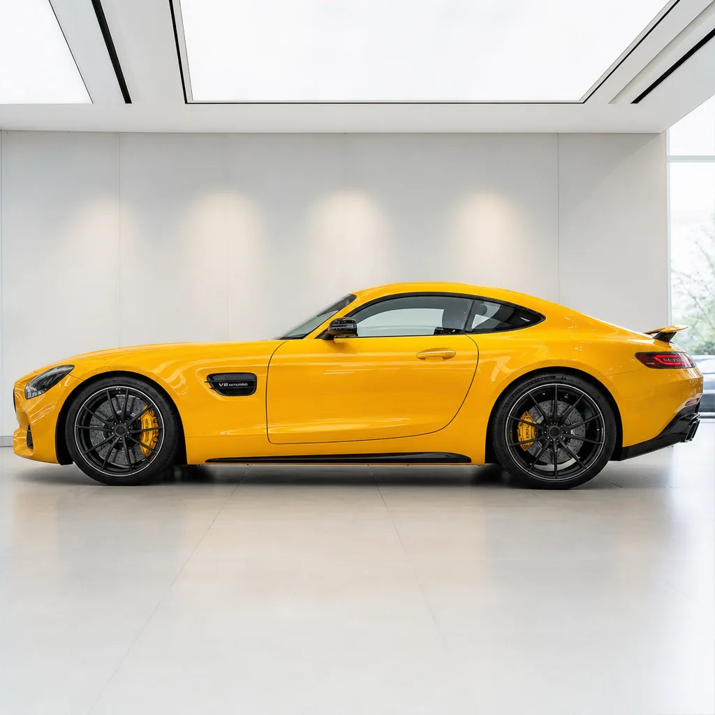 Metallic Volcanic Yellow gloss colored PPF wrapped on a Mercedes-AMG GT side profile | Veloro