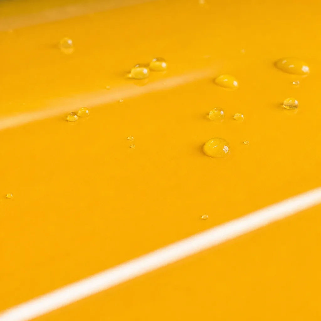 Close-up of Metallic Volcanic Yellow gloss colored PPF surface texture | Veloro