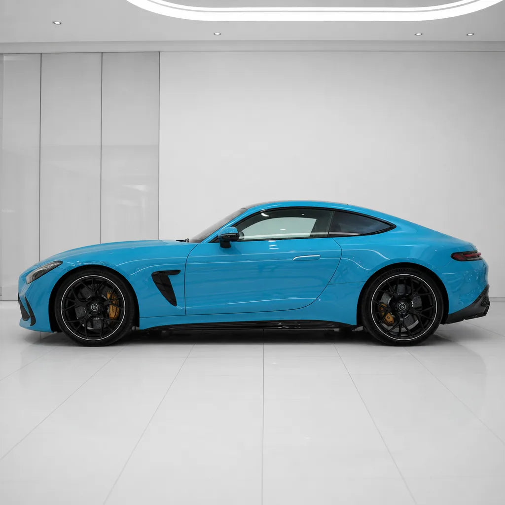 Miami Blue gloss colored PPF wrapped on a Mercedes-AMG GT side profile | Veloro