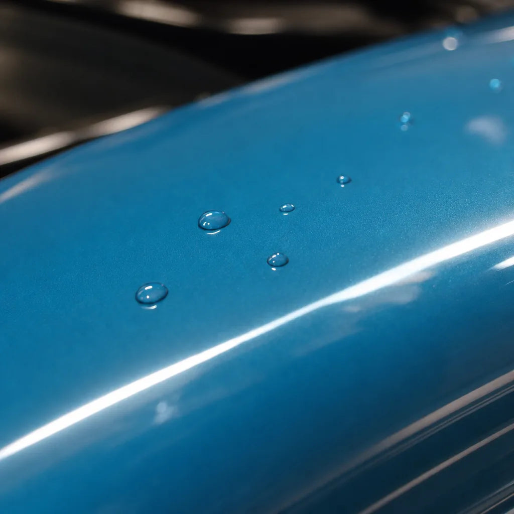 Close-up of Miami Blue gloss colored PPF surface texture | Veloro