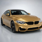 Milan Gold gloss colored PPF wrapped on a BMW M4 | Veloro