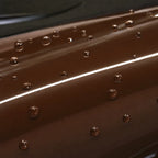 Close-up of Paint Chocolate gloss colored PPF surface texture | Veloro