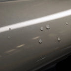 Close-up of Rock Gray gloss colored PPF surface texture | Veloro
