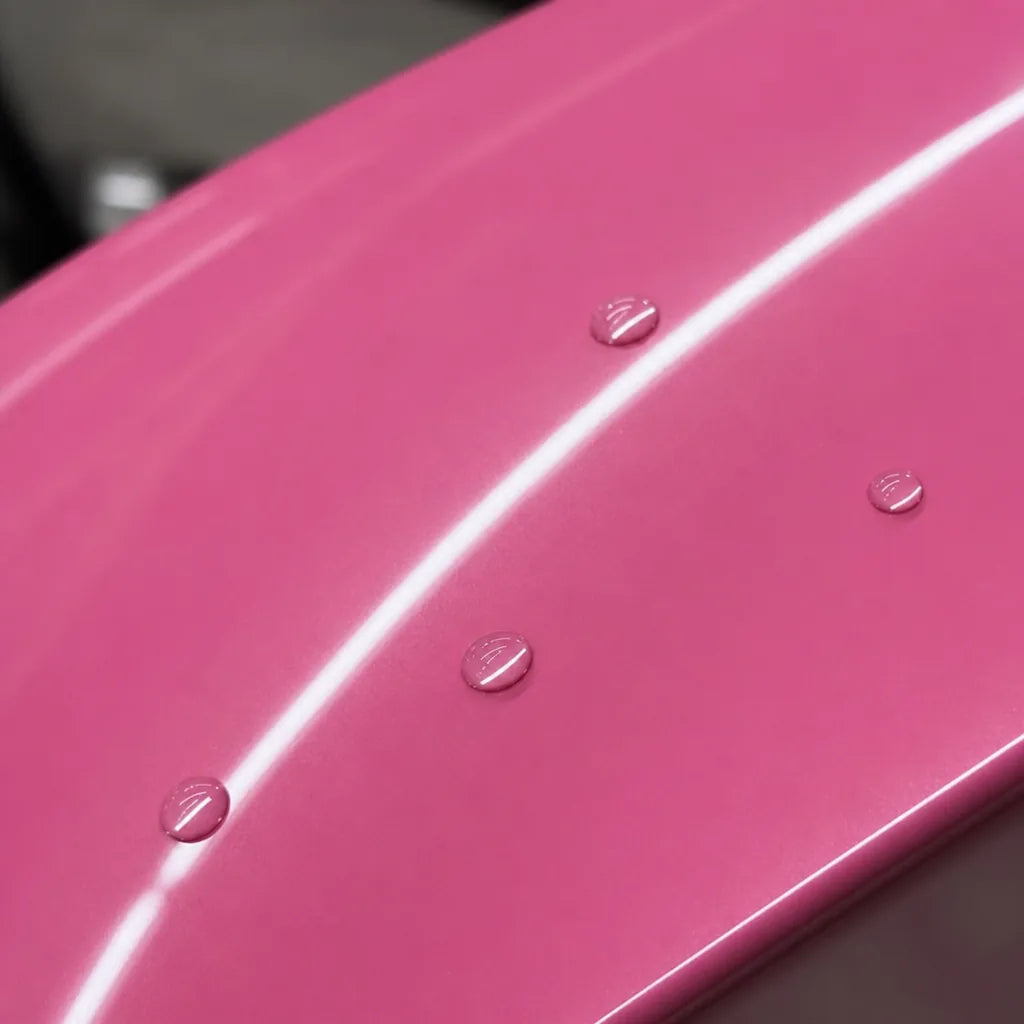Close-up of Romantic Pink Color PPF gloss colored PPF surface texture | Veloro