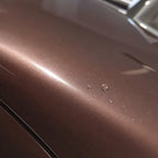 Close-up of Rouge Pearl Pink gloss colored PPF surface texture | Veloro