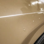 Close-up of Sahara Yellow gloss colored PPF surface texture | Veloro