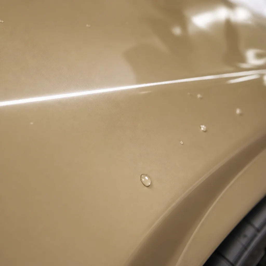 Close-up of Sahara Yellow gloss colored PPF surface texture | Veloro