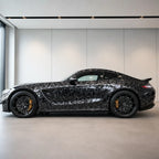 Silver Forged Carbon Fiber Color PPF gloss colored PPF wrapped on a Mercedes-AMG GT side profile | Veloro