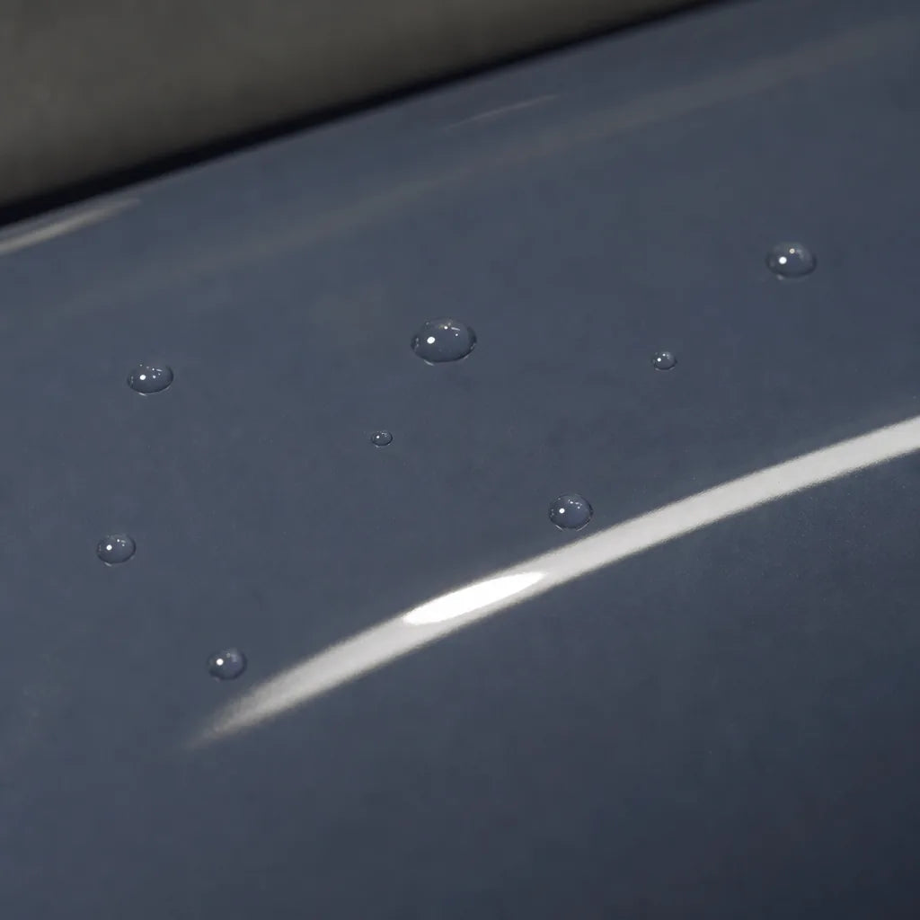 Close-up of Slate Grey gloss colored PPF surface texture | Veloro