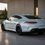 Luxury car wrapped in Soaring Grey Metallic gloss colored PPF at golden hour | Veloro