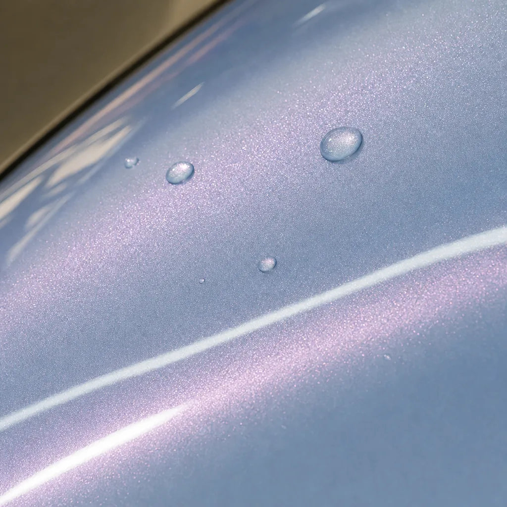 Close-up of Starry Pink Gold gloss colored PPF surface texture | Veloro