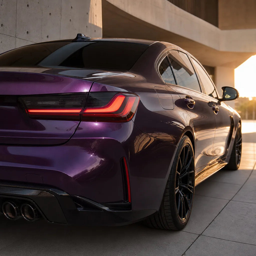 Luxury car wrapped in Super Bright Black Magic Purple gloss colored PPF at golden hour | Veloro