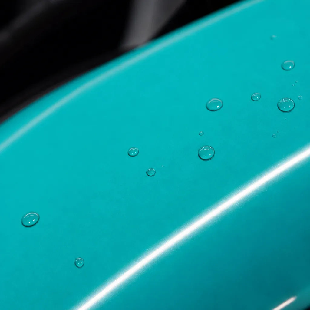 Close-up of Turquoise Blue gloss colored PPF surface texture | Veloro