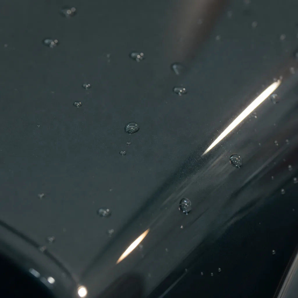 Close-up of Yugali Blue gloss colored PPF surface texture | Veloro