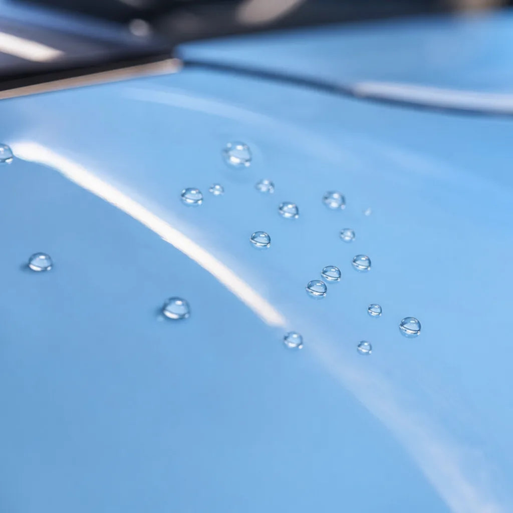 Close-up of Zandvoort Blue gloss colored PPF surface texture | Veloro
