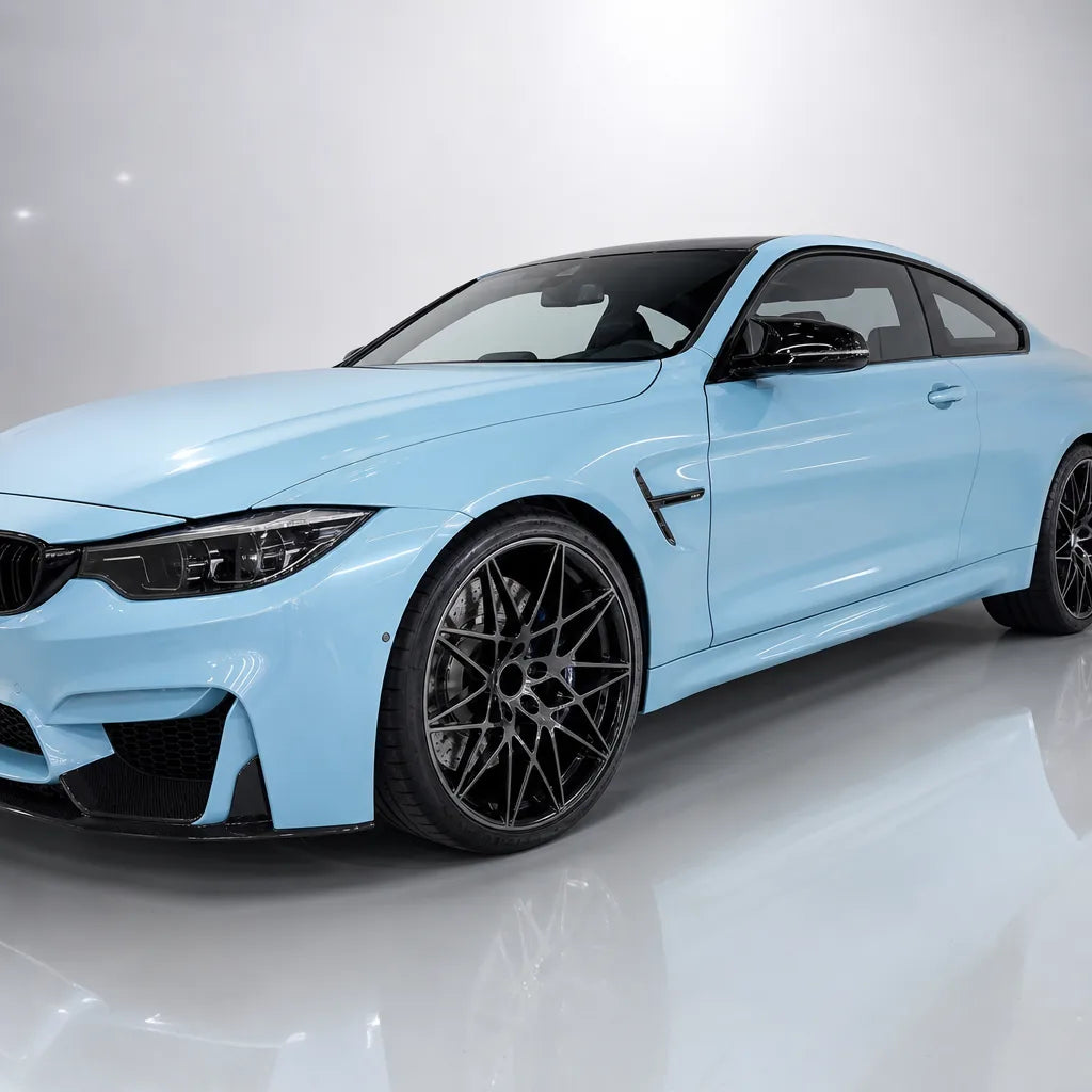 Glossy Baby Blue gloss colored PPF wrapped on a BMW M4 | Veloro