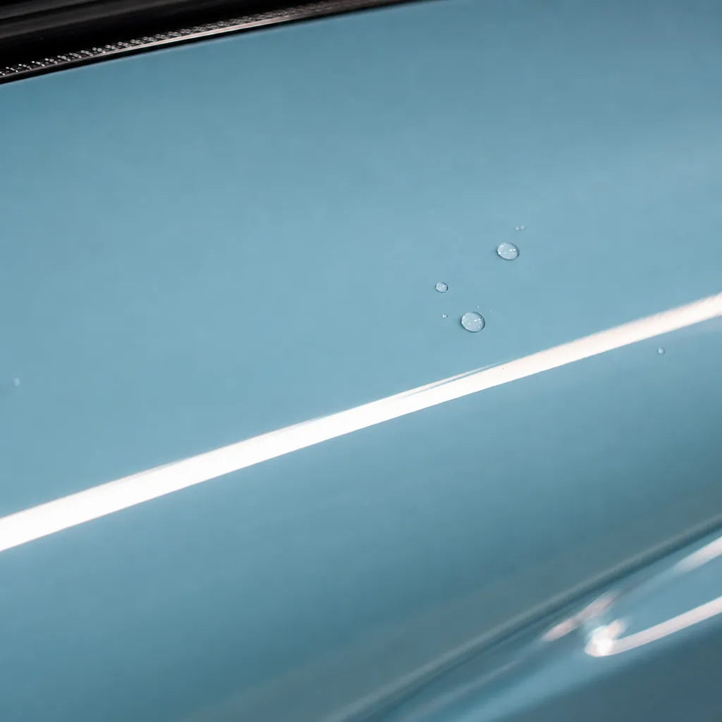 Close-up of Glossy Baby Blue gloss colored PPF surface texture | Veloro