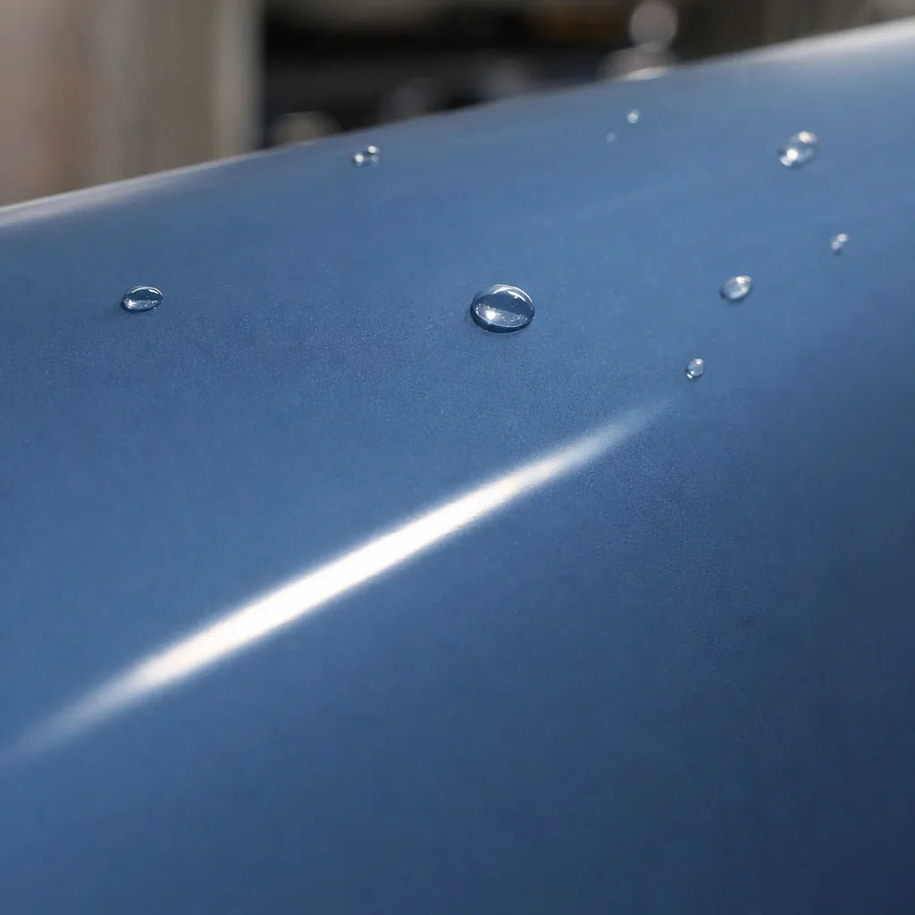 Close-up of Glossy China Blue gloss colored PPF surface texture | Veloro