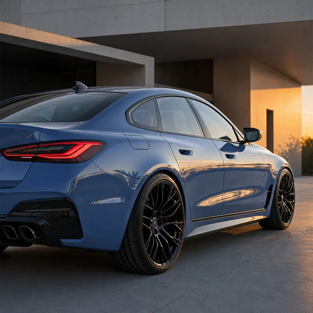 Luxury car wrapped in Glossy China Blue gloss colored PPF at golden hour | Veloro