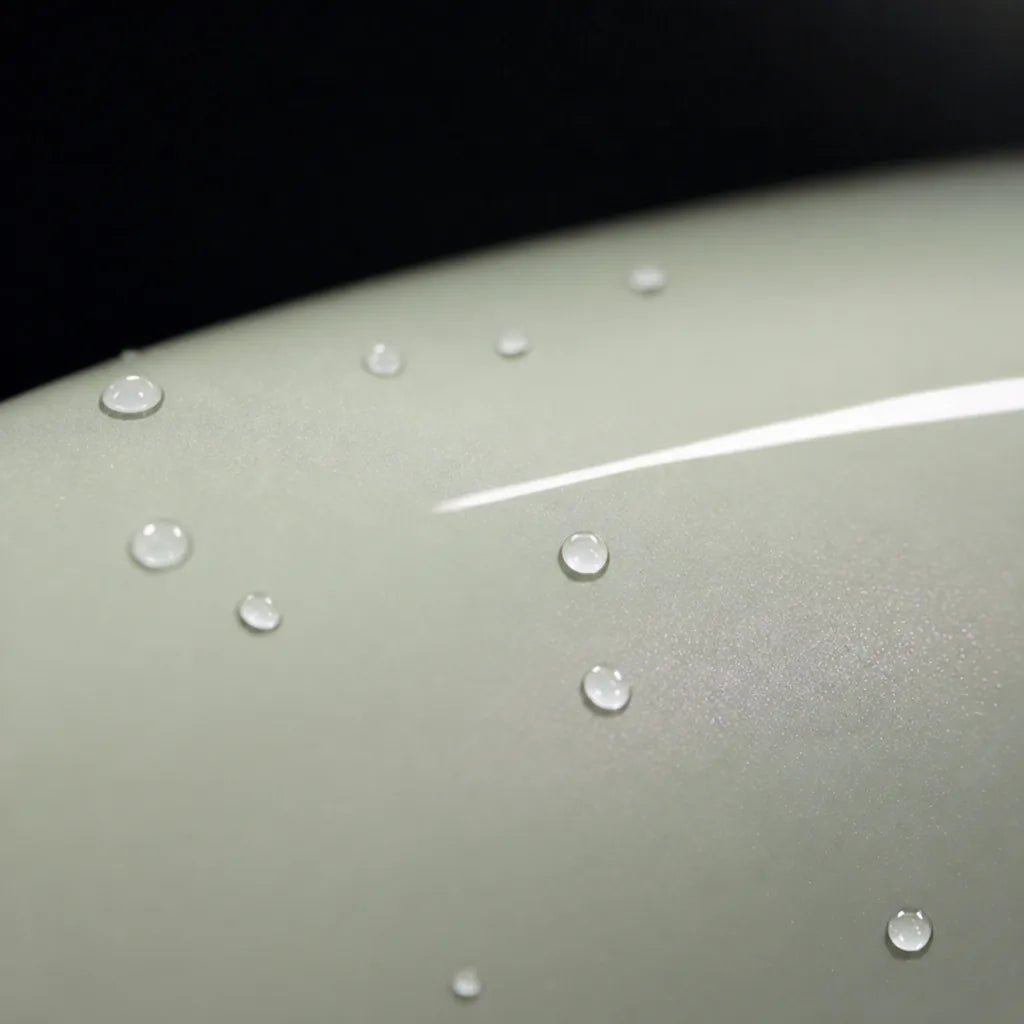 Close-up of Glossy Diamond White Pink gloss colored PPF surface texture | Veloro