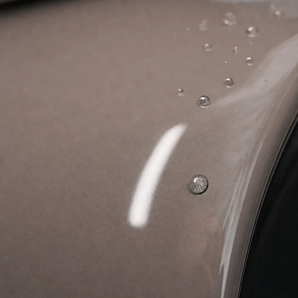 Close-up of Glossy First Love Pink gloss colored PPF surface texture | Veloro