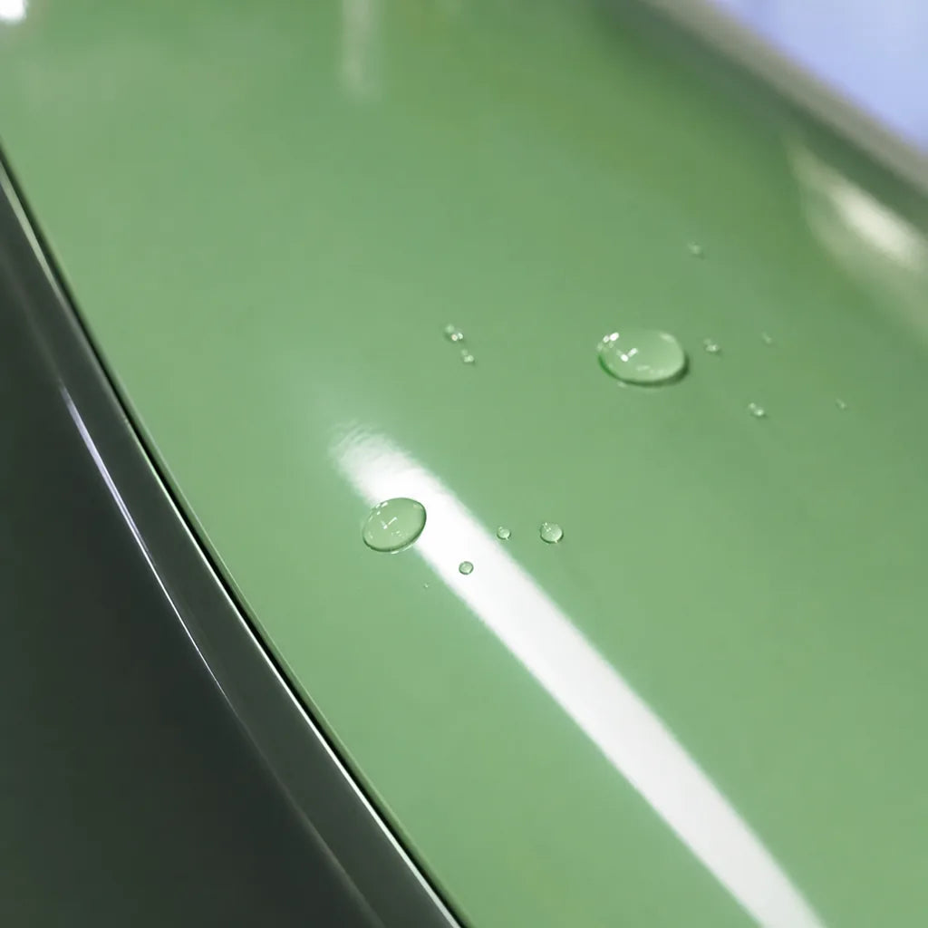 Close-up of Glossy Hazy Green gloss colored PPF surface texture | Veloro