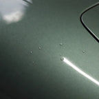 Close-up of Glossy Metallic Francesca Green gloss colored PPF surface texture | Veloro