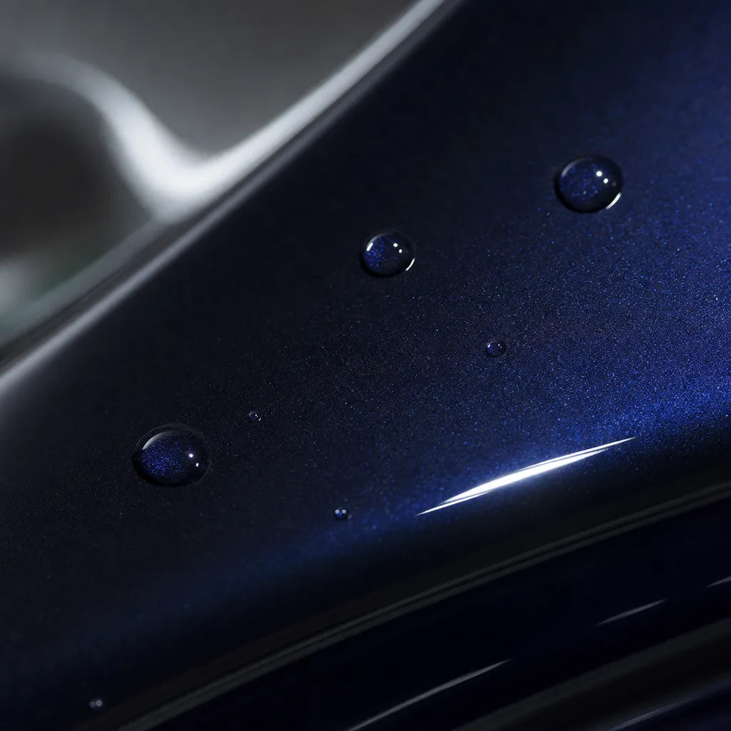 Close-up of Glossy Metallic Glitter Black Blue gloss colored PPF surface texture | Veloro