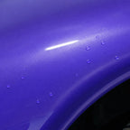 Close-up of Glossy Metallic Royalty Explosion Purple gloss colored PPF surface texture | Veloro