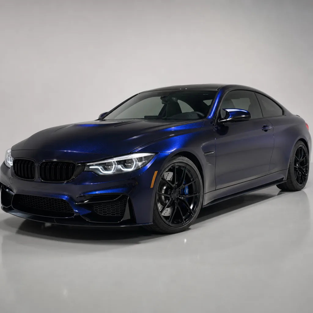Glossy Metallic Tanzanite Blue gloss colored PPF wrapped on a BMW M4 | Veloro