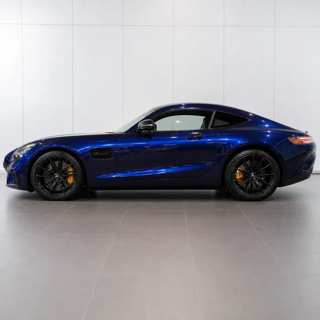 Glossy Metallic Tanzanite Blue gloss colored PPF wrapped on a Mercedes-AMG GT side profile | Veloro
