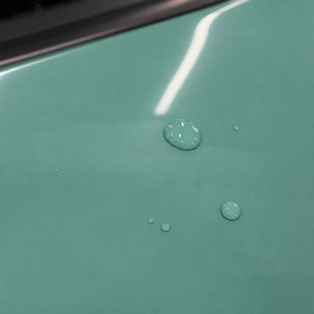 Close-up of Glossy Mint Green gloss colored PPF surface texture | Veloro