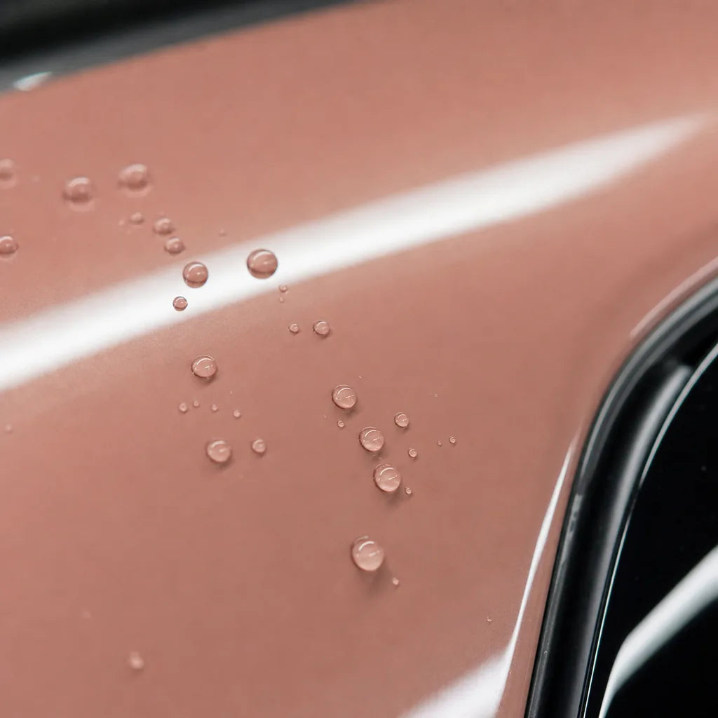 Close-up of Glossy Pearl Baby Pink gloss colored PPF surface texture | Veloro