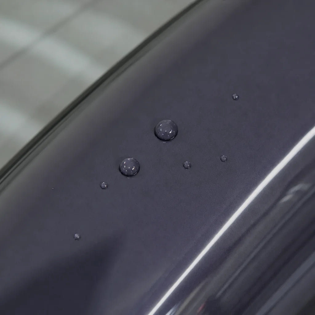 Close-up of Glossy Provence Lavender Purple gloss colored PPF surface texture | Veloro