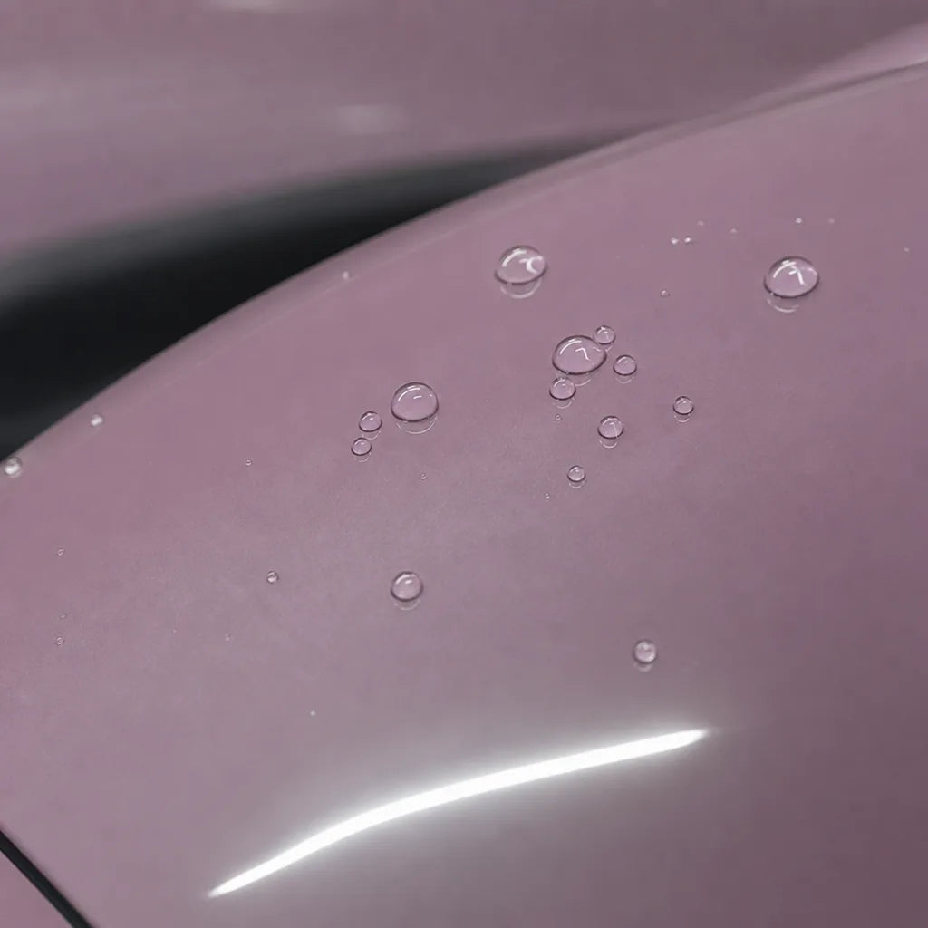 Close-up of Glossy Rose Latte Pink gloss colored PPF surface texture | Veloro