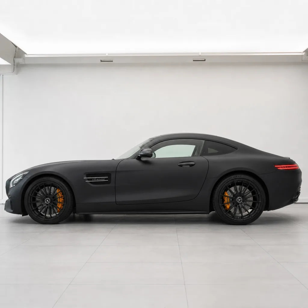 Metal Ceramic Black matte colored PPF wrapped on a Mercedes-AMG GT side profile | Veloro