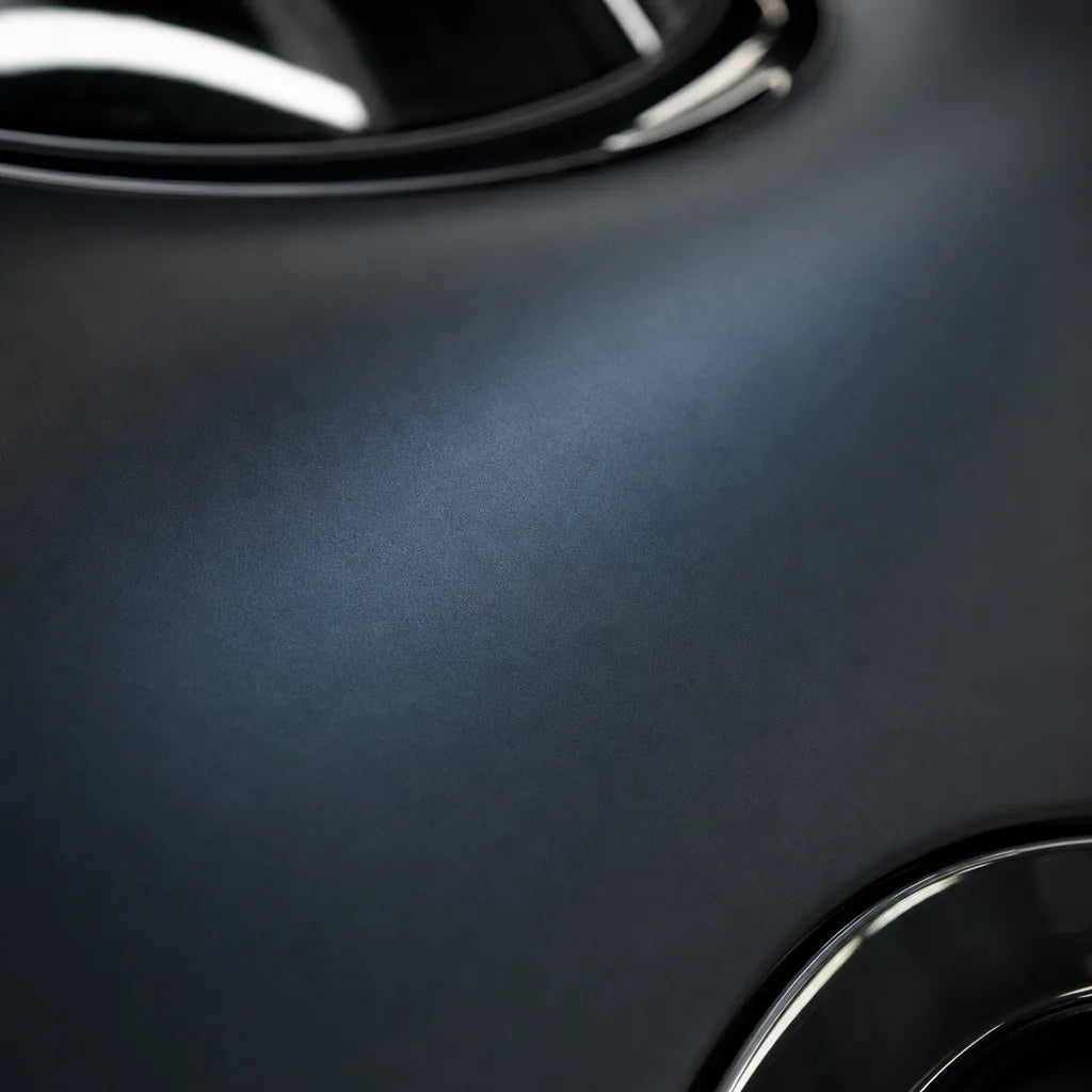 Close-up of Black Phantom Blue matte colored PPF surface texture | Veloro