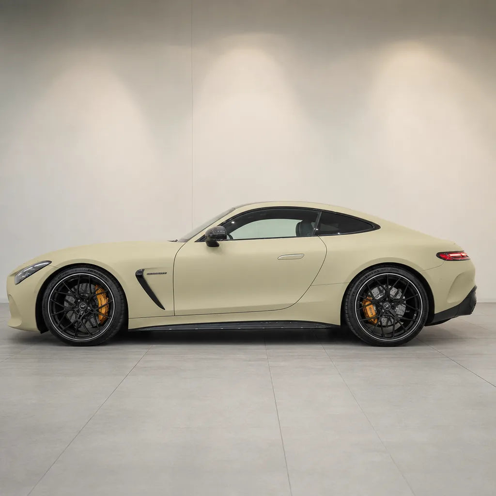 Desert Yellow matte colored PPF wrapped on a Mercedes-AMG GT side profile | Veloro