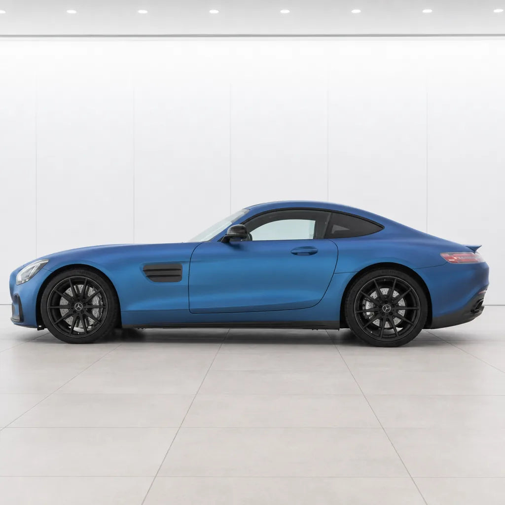 Magic Flame Dark Blue matte colored PPF wrapped on a Mercedes-AMG GT side profile | Veloro