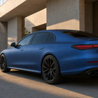 Luxury car wrapped in Magic Flame Dark Blue matte colored PPF at golden hour | Veloro