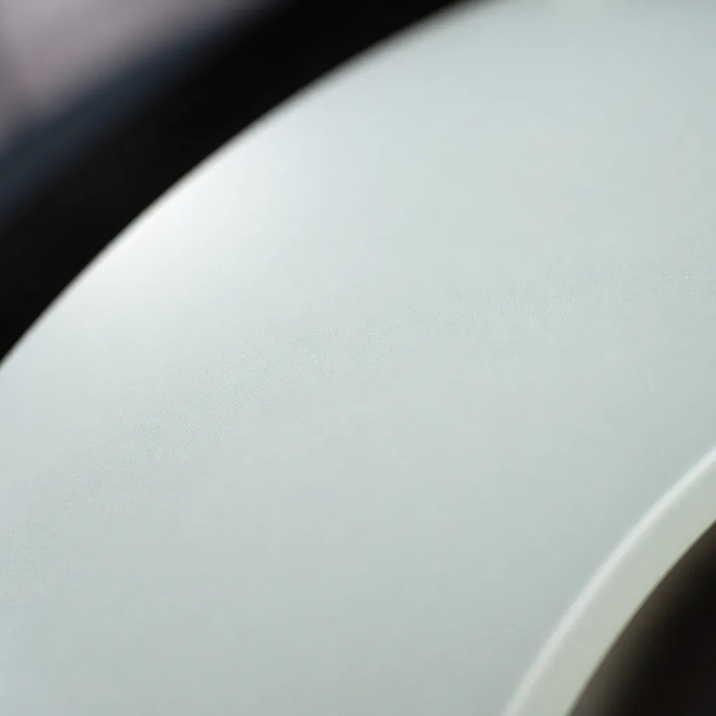 Close-up of Metallic Chameleon Gold White matte colored PPF surface texture | Veloro