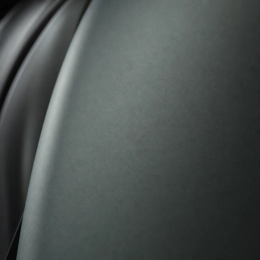 Close-up of Metallic Satin Mystical Green matte colored PPF surface texture | Veloro
