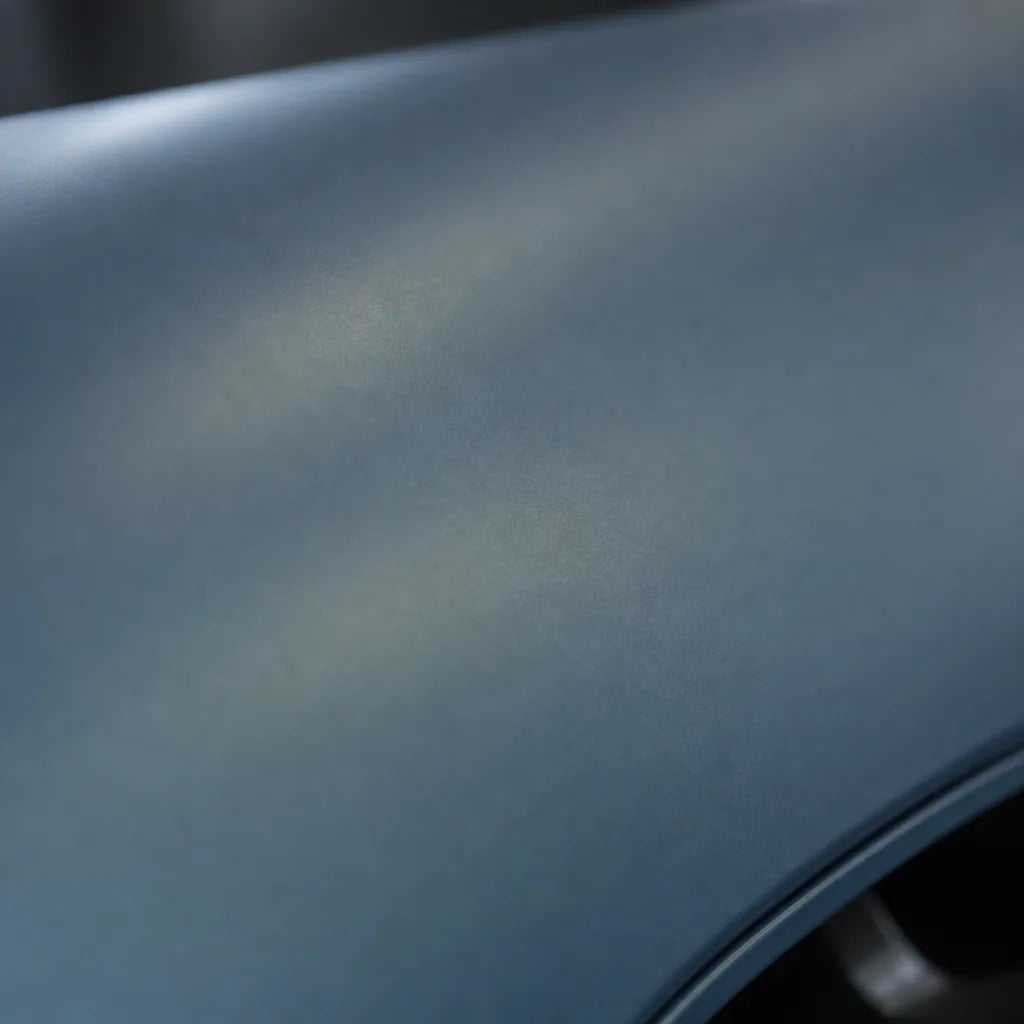Close-up of Metallic Titanium matte colored PPF surface texture | Veloro