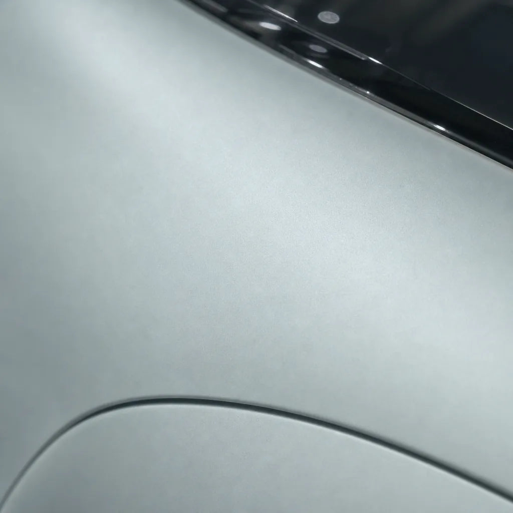 Close-up of Metallic Titanium Silver matte colored PPF surface texture | Veloro