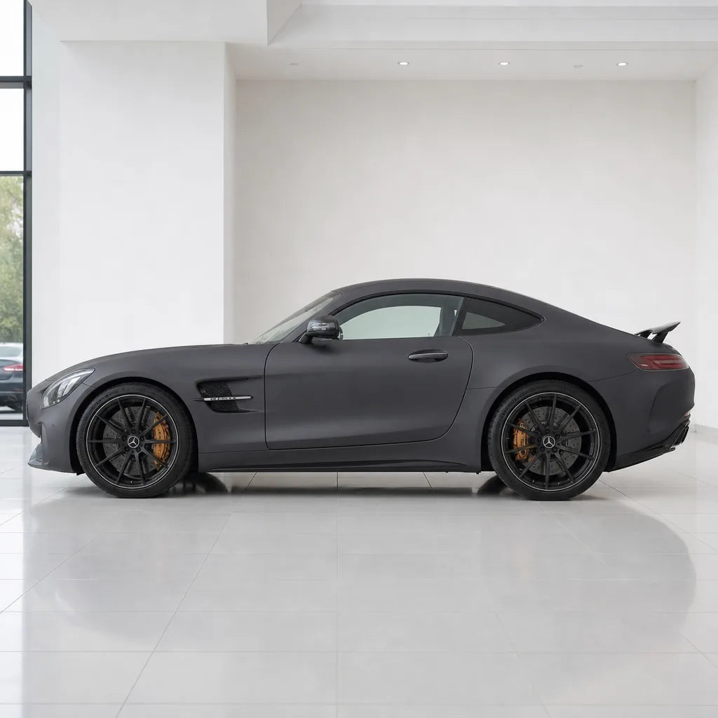 Rock Grey matte colored PPF wrapped on a Mercedes-AMG GT side profile | Veloro