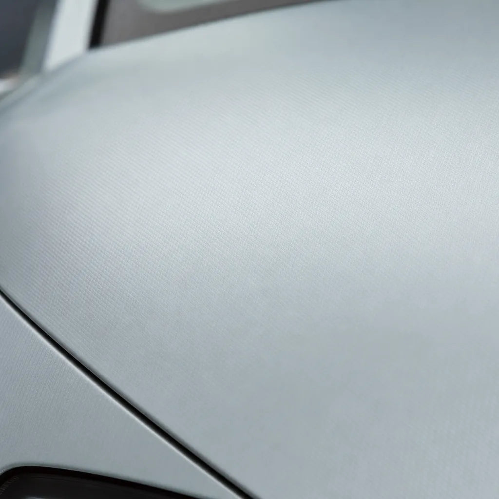 Close-up of Silver Carbon Fiber matte colored PPF surface texture | Veloro
